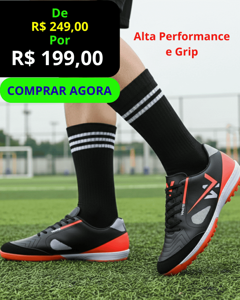 chuteira-society-profissional-dry-2026-preta-laranja. Chuteira Society Profissional DRY 2026 nas cores preto e laranja, com solado de alta aderência para grama sintética.